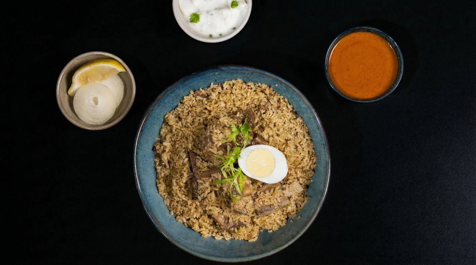 Dindigul mutton biryani Seeragasamba rice House of Chettinad Leander TX