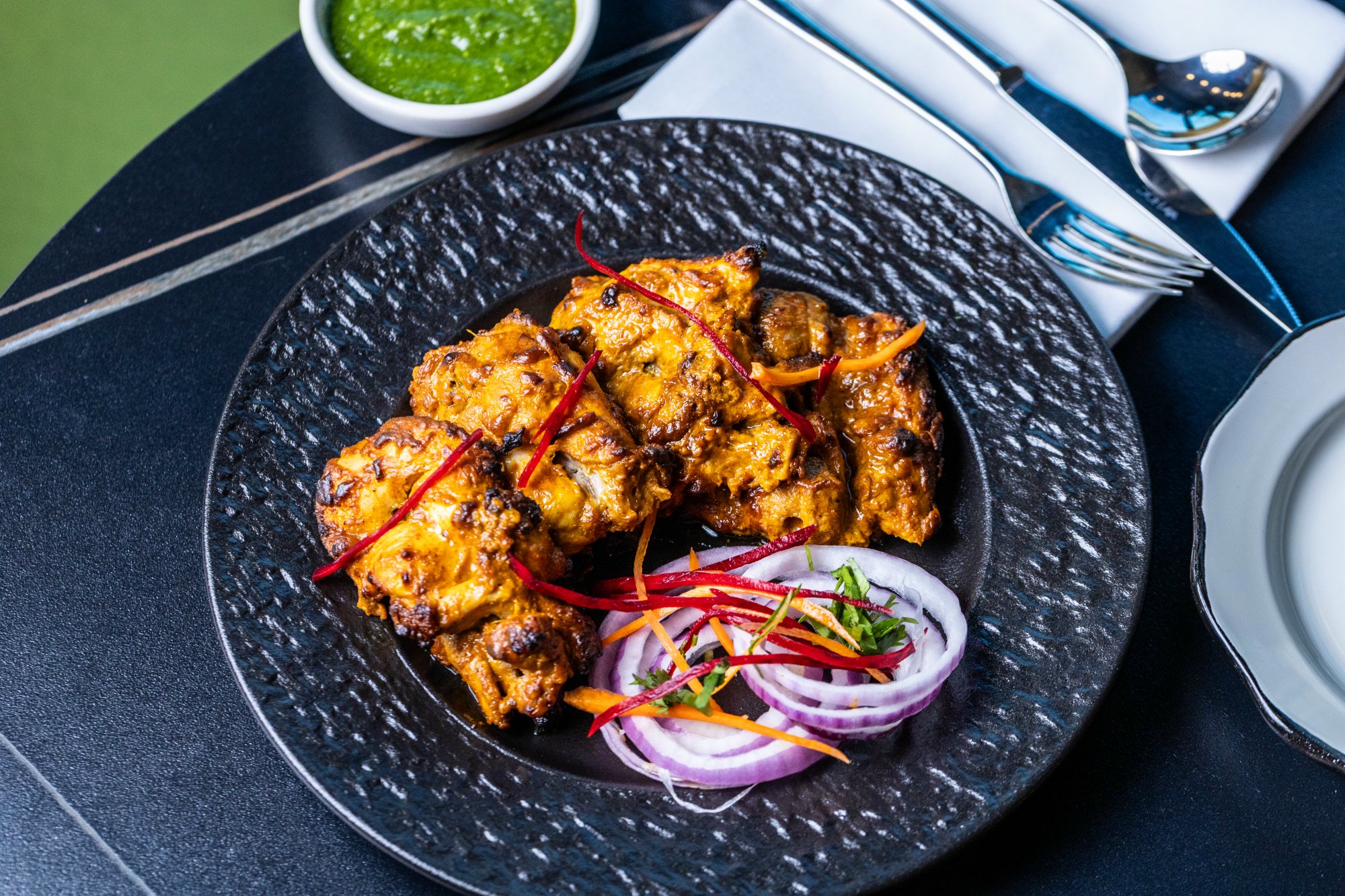 Classic Chicken Tikka traditional red marinade House of Chettinad Leander TX